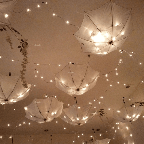Elegant Housewarming Celebration with Ambient Lighting and Floral Decor 3